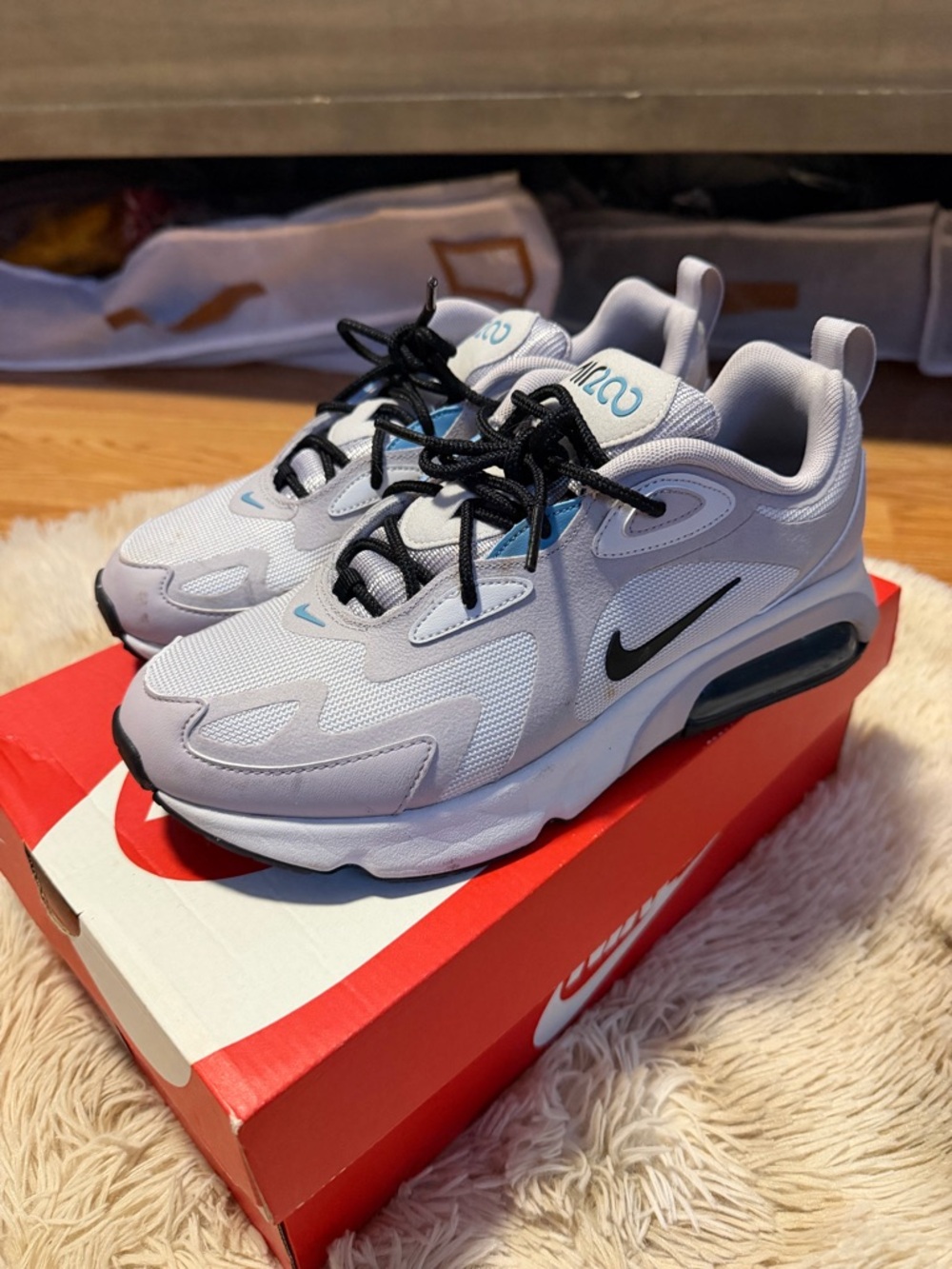 Nike White and Light Blue Low-Top Sneakers with Black Accents - Picture 2 of 4